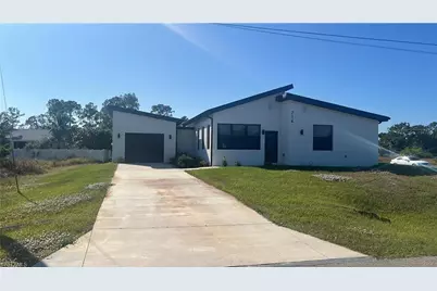714 Chambers St E, Lehigh Acres, FL 33974 - Photo 1
