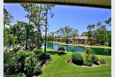 5656 Woodmere Lake Cir #C204, Naples, FL 34112 - Photo 1