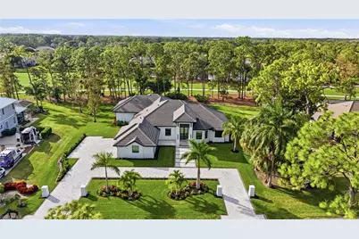 13455 Pond Apple Dr E, Naples, FL 34119 - Photo 1