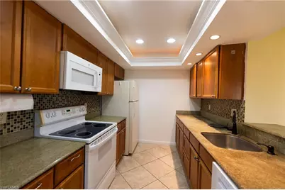 3655 Boca Ciega Dr #306, Naples, FL 34112 - Photo 1