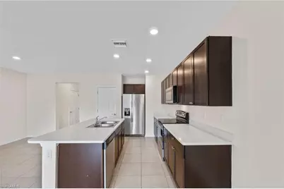 15484 Wildflower Cir, Naples, FL 34119 - Photo 1