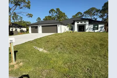 704 Cortez Ave, Lehigh Acres, FL 33972 - Photo 1