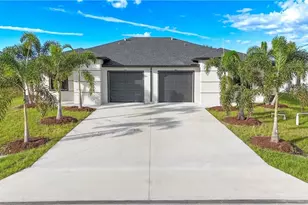 843 Duplex St E, Lehigh Acres, FL 33974 - Photo 1