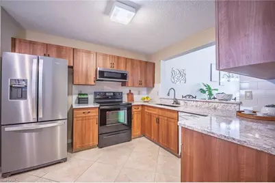 613 Squire Cir #204, Naples, FL 34104 - Photo 1