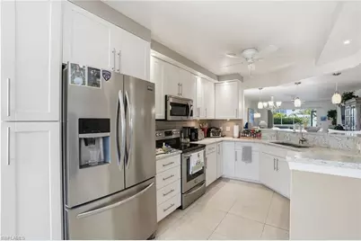 360 Horse Creek Dr #101, Naples, FL 34110 - Photo 1