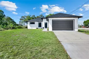 100 Parish Dr, Lehigh Acres, FL 33974 - Photo 1