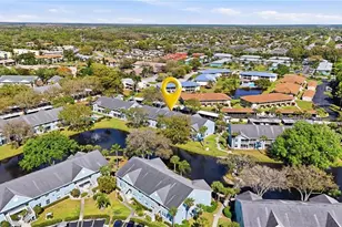 141 Wading Bird Cir, Naples, FL 34110 - Photo 1
