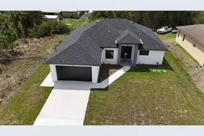 2561 25th St W, Lehigh Acres, FL 33971 - Photo 1