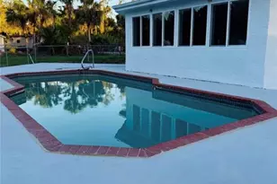 250 10th St NE, Naples, FL 34120 - Photo 1