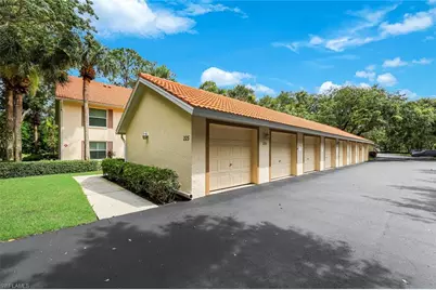 225 Robin Hood Cir #101, Naples, FL 34104 - Photo 1