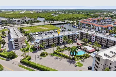 803 River Point Dr #107B, Naples, FL 34102 - Photo 1