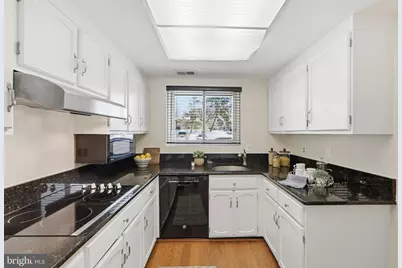 3233 S Leisure World Boulevard #106-B, Silver Spring, MD 20906 - Photo 2