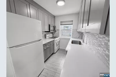 54 Broad Avenue 4A #4A, Palisades Park, NJ 07650 - Photo 1