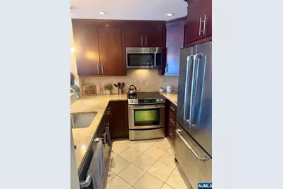 102 Nelson Court O102 #O102, Edgewater, NJ 07020 - Photo 1