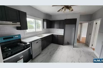 99 Carlton Avenue, East Rutherford, NJ 07073 - Photo 1
