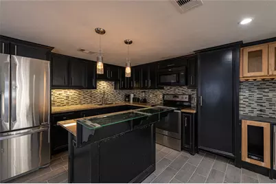 7610 Harlem Street, Baytown, TX 77521 - Photo 8