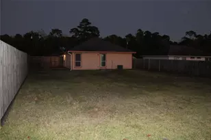 8825 E Buffalo Cir, Willis, TX 77378 - Photo 12