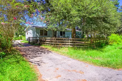 389 County Road 2281, Cleveland, TX 77327 - Photo 1