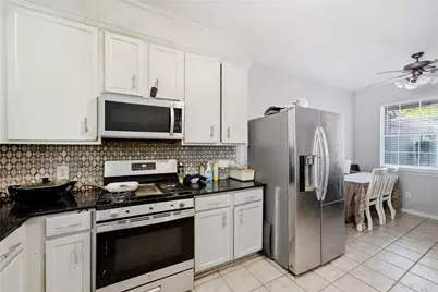 2926 Meadowglen Cove, Houston, TX 77082 - Photo 8