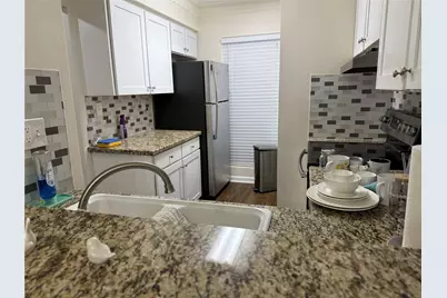 9107 Braeburn Valley Drive #15, Houston, TX 77074 - Photo 6