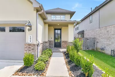 1439 Northwood Bluff Lane, Pinehurst, TX 77362 - Photo 2