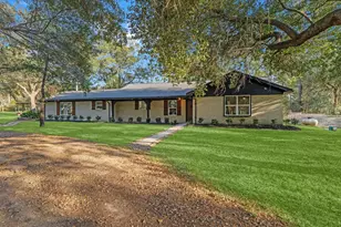 303 W Rollingwood St, Pinehurst, TX 77362 - Photo 1