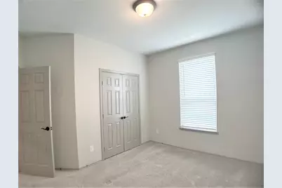 8656 Hollyoaks Creek Lane, Houston, TX 77063 - Photo 24