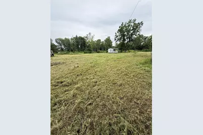 606 Highway 90, Ames, TX 77575 - Photo 1