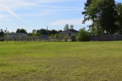 1129 County Road 5100, Cleveland, TX 77327 - Photo 10