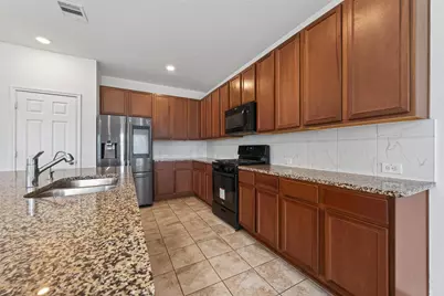 611 Ash Mill Drive, Houston, TX 77090 - Photo 12