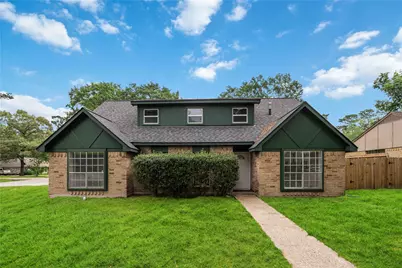 203 Wedgewood Court, Oak Ridge North, TX 77386 - Photo 1
