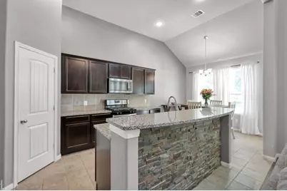 13335 Hidden Manor Court, Willis, TX 77318 - Photo 12