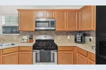 12707 Sandbur Valley Way, Houston, TX 77045 - Photo 12