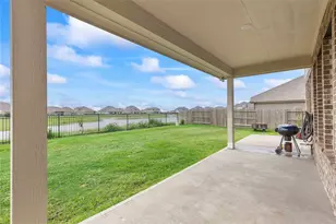 9818 Colonial Downs Dr, Mont Belvieu, TX 77523 - Photo 32