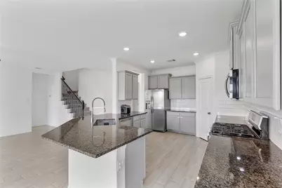 9818 Colonial Downs Drive, Mont Belvieu, TX 77523 - Photo 12