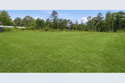 672 County Road 3317, Cleveland, TX 77327 - Photo 24