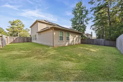 5604 S Buffalo Circle, Willis, TX 77378 - Photo 4