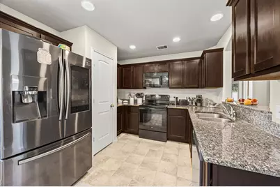 5604 S Buffalo Circle, Willis, TX 77378 - Photo 10