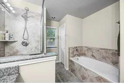 5604 S Buffalo Circle, Willis, TX 77378 - Photo 16