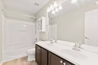 2694 Woodspring Forest Drive, Houston, TX 77345 - Photo 22