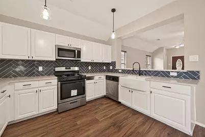 9418 Belleclaire Lane, Houston, TX 77044 - Photo 14