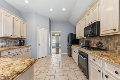 7610 Limber Bough Drive, Humble, TX 77346 - Photo 16