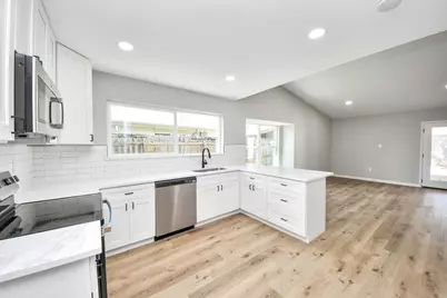 7718 Woodnettle Lane, Houston, TX 77086 - Photo 12