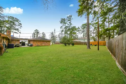 203 Ridgewood Drive, Oak Ridge North, TX 77386 - Photo 34