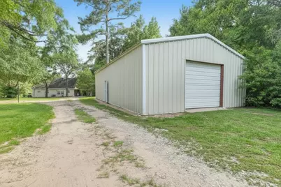 10147 Lewis Creek Circle, Willis, TX 77318 - Photo 30