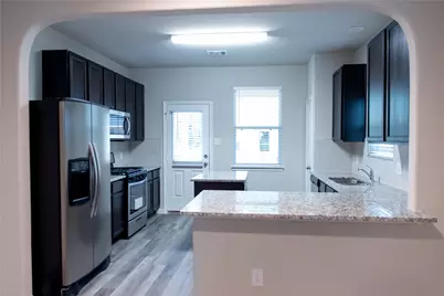 13433 Cannon Creek Court, Willis, TX 77378 - Photo 4