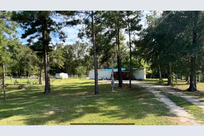 406 County Road 3415, Cleveland, TX 77327 - Photo 1