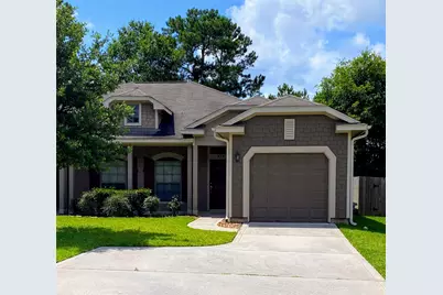 58 Woodland Hills Drive #B, Conroe, TX 77303 - Photo 1
