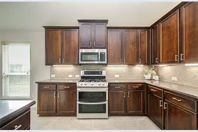 3322 Boomer Boulevard, Mont Belvieu, TX 77523 - Photo 20