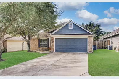 957 Oak Terrace Drive, Willis, TX 77378 - Photo 1